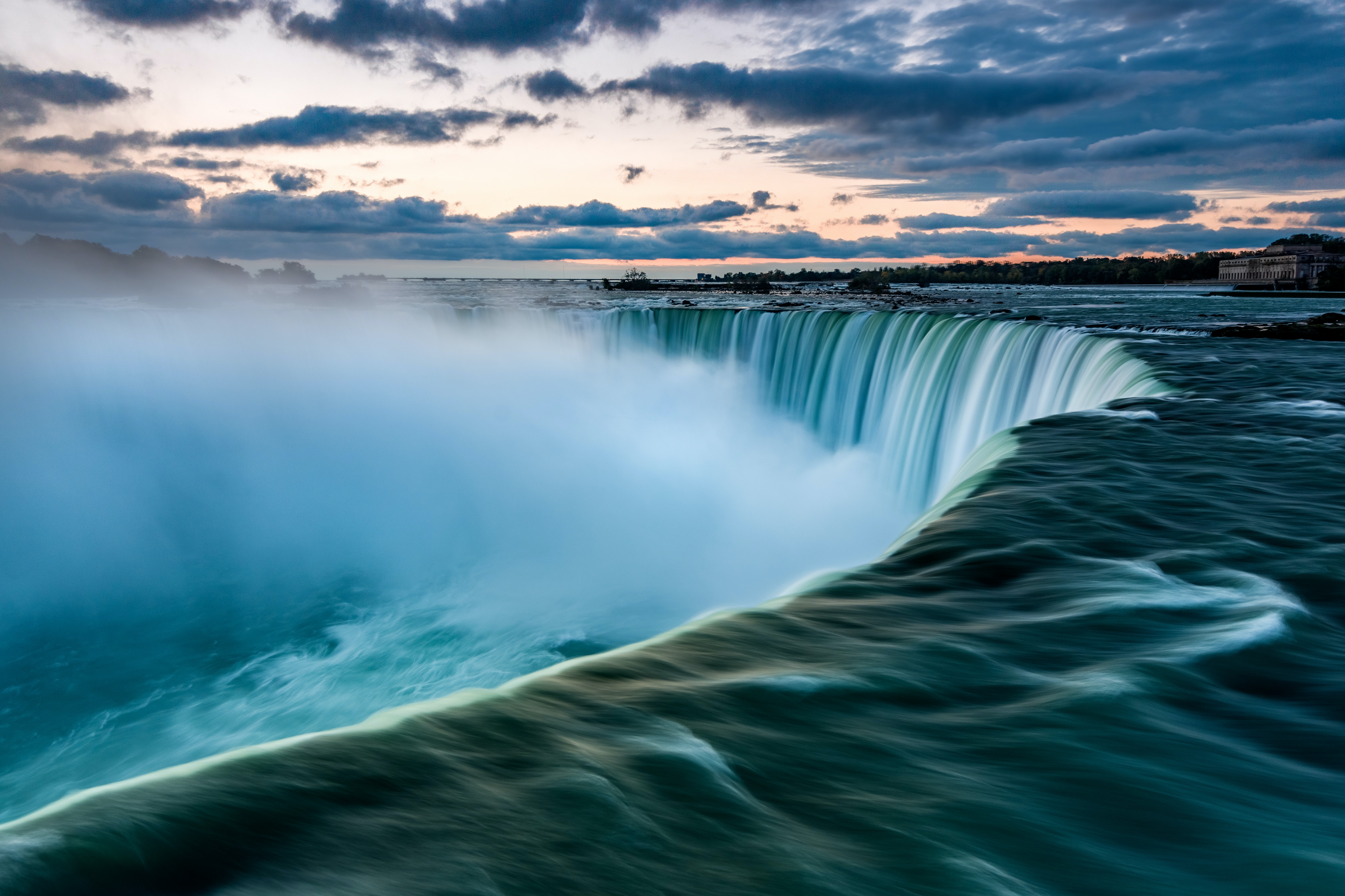 Experience the energy and beauty of Somatic Release Breathwork, capturing the power and calm of Niagara Falls at dusk—mist rising, dramatic clouds above, and a sense of renewal flowing through every breath.