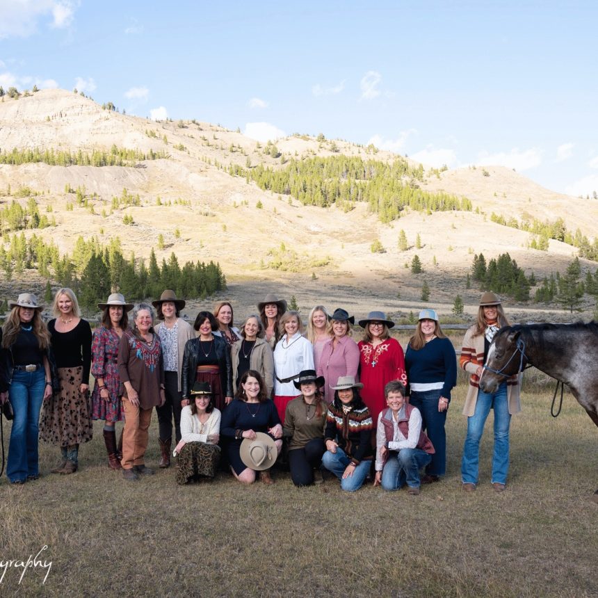 Women with horses at a Montana cowgirl yoga retreat