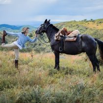 Women horseback riding during the Cowgirl Yoga retreat in Argentina