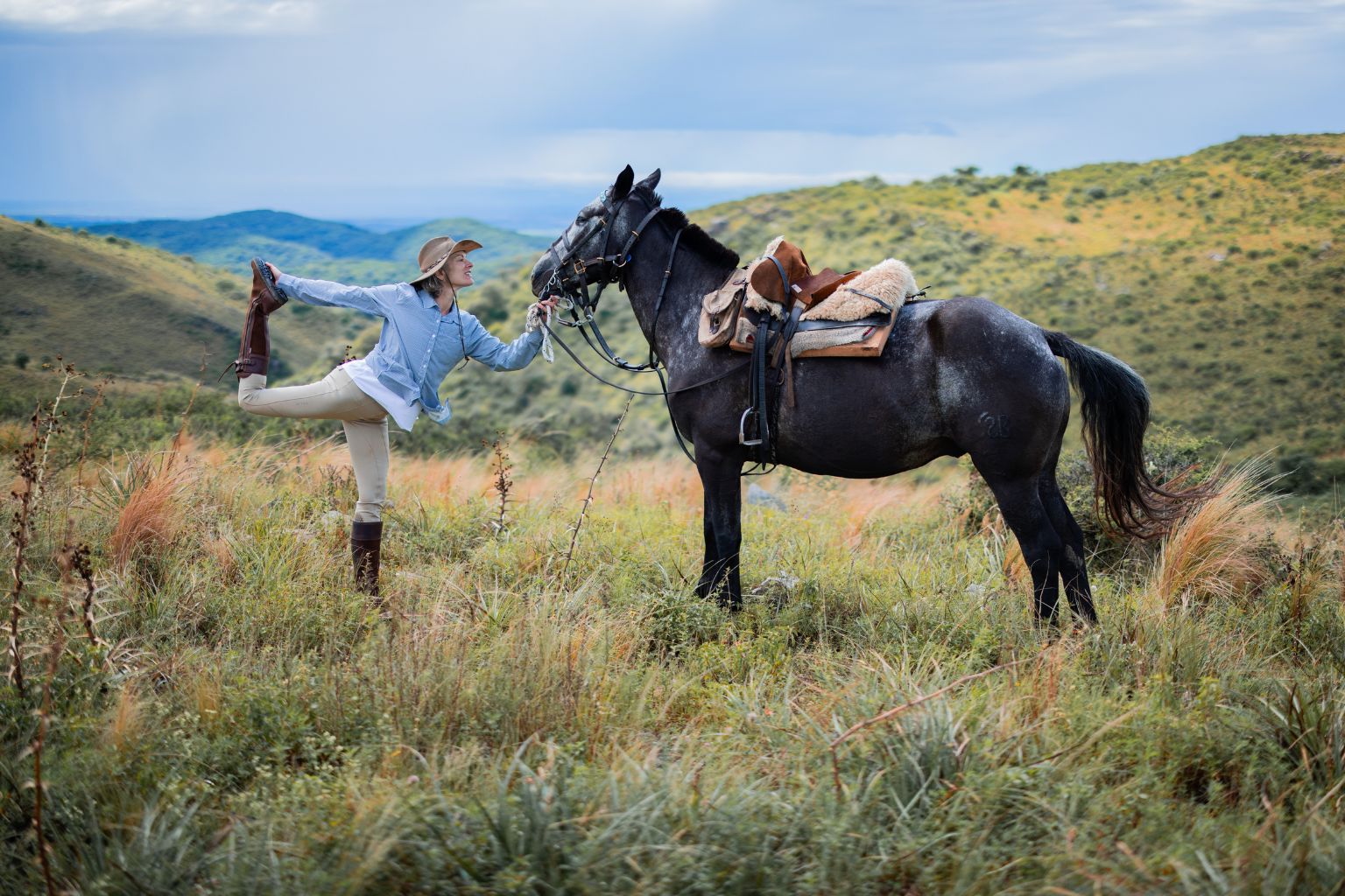 Women horseback riding during the Cowgirl Yoga retreat in Argentina
