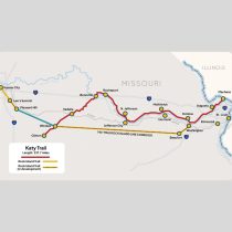 Map of Missouri showing the Katy Trail in red, stretching from Clinton to Machens, with key towns marked along the route. The developing Rock Island Trail is indicated with a yellow dashed line.
