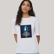 A woman wearing a white t-shirt with a graphic of a rocket launching from a digital circuit board design.